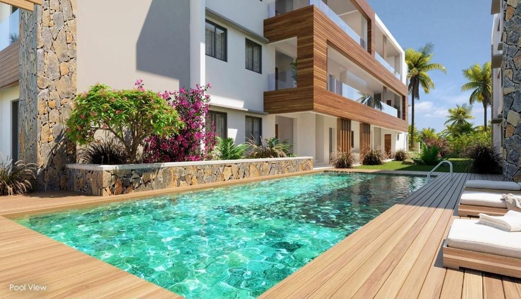 Soleia, 1 ou 2 Appts 2ch ds Residence piscine, salle de sport 50m de la mer Grand Baie Extérieur photo